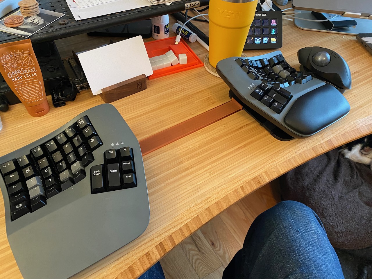 an image of my keyboard halves connected by a copper colored bridge of 3d printed plastic
